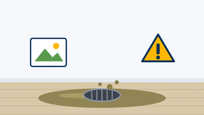 Floor drain backing up into a room, with a hazard warning sign